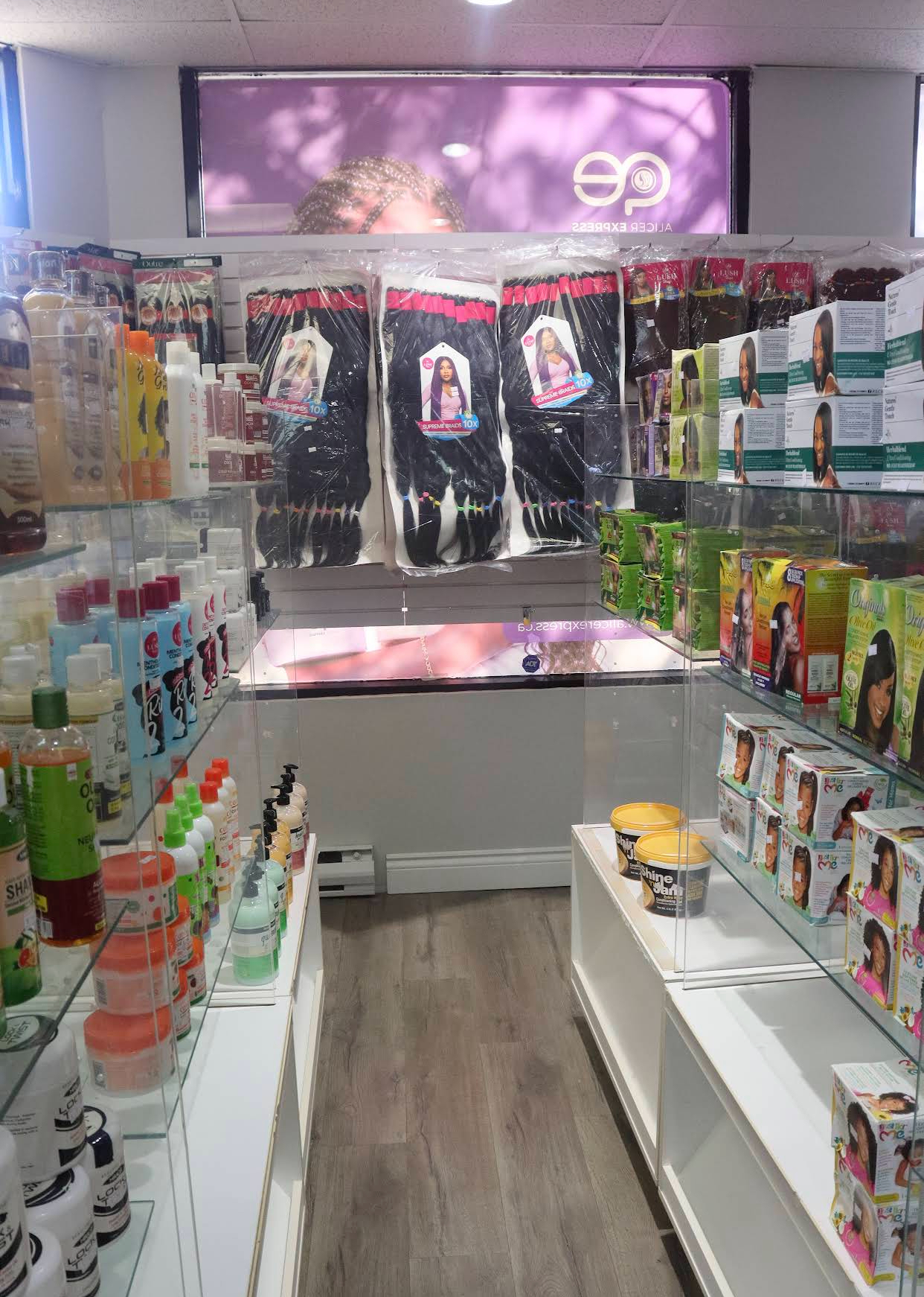 Product shelves and packaged hair extensions inside ALICER EXPRESS